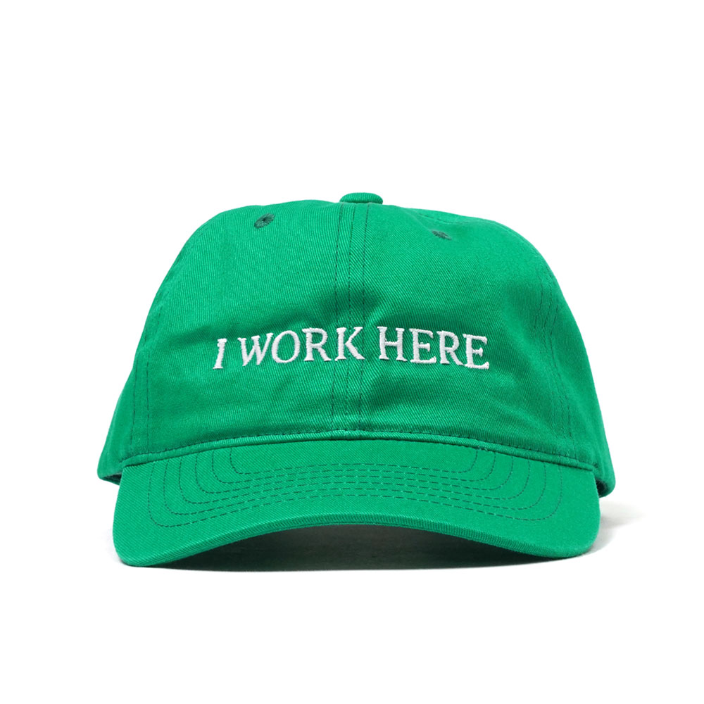 I WORK HERE SOMETIMES HAT GREEN