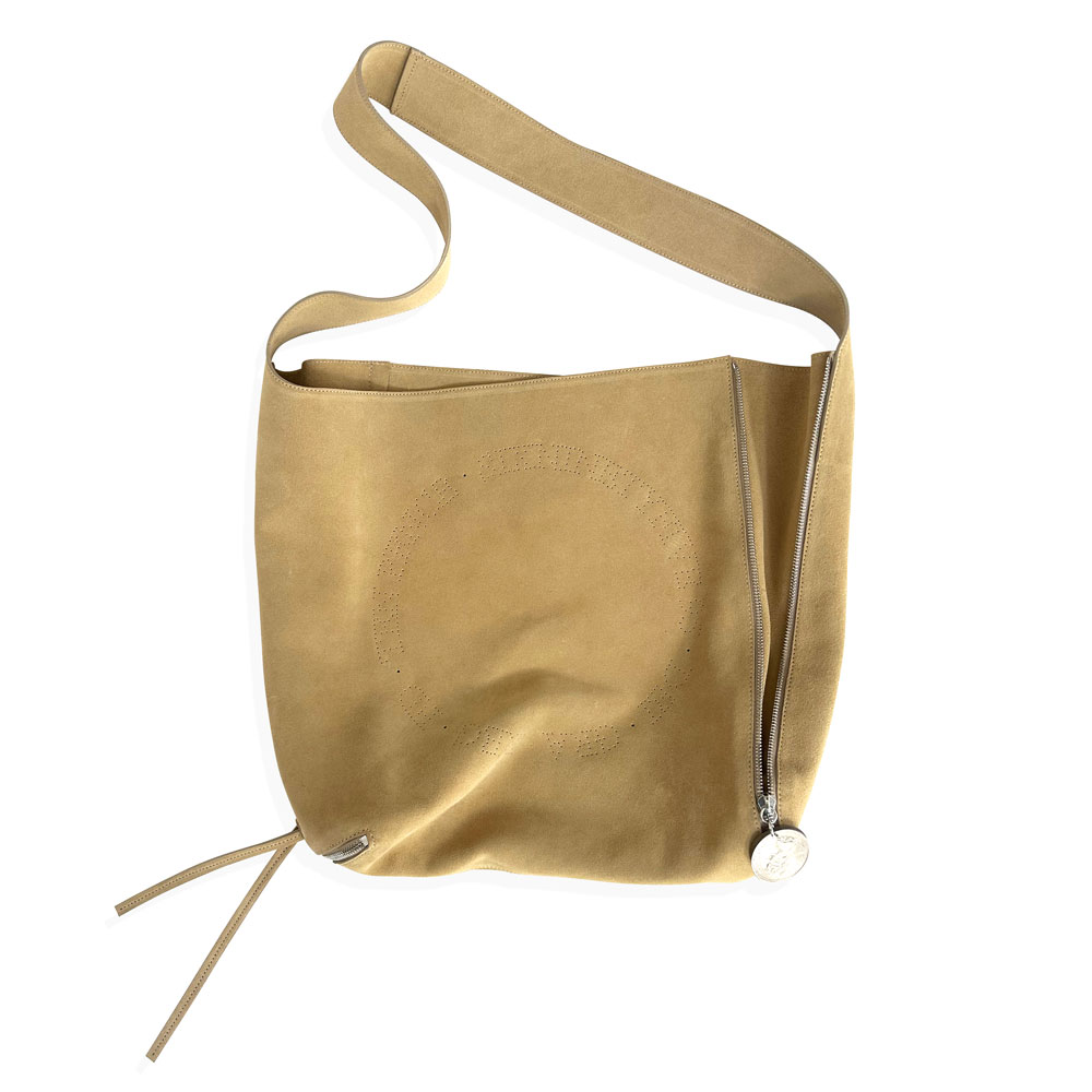 LEGAL TENDER CROSS BODY SAND SUEDE WITH PERFORATION